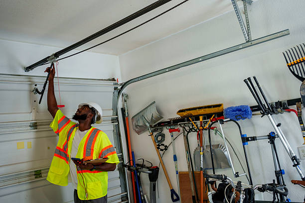 Professional Garage Door Installation technician working in Fall River, WI